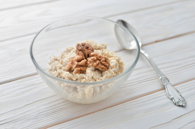 Healthy eating right.  Oatmeal with walnuts