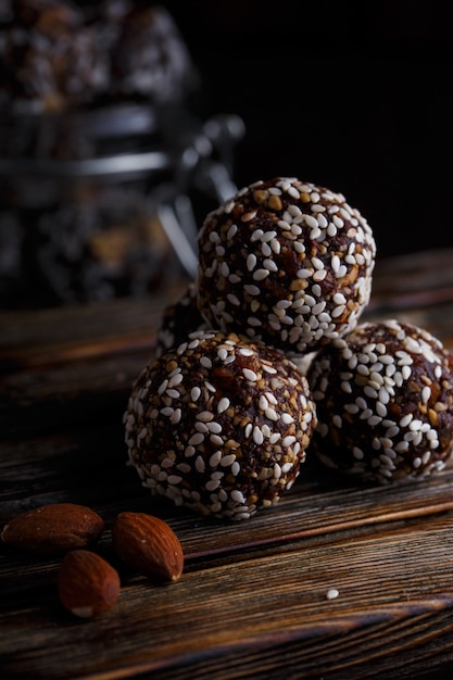 Healthy energy organic vegetarian bites with nuts, dates, honey and sesame