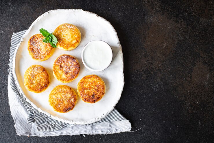 Photo healthy food cheesecake sweet curd breakfast syrniki dessert cottage cheese pancakes
