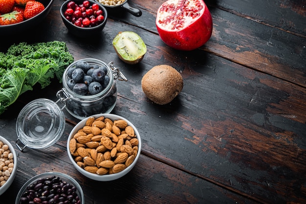 Healthy food on dark wooden background