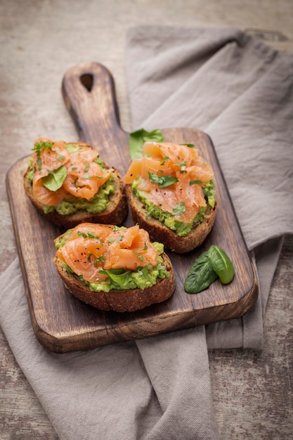 Healthy food, Keto dieting, avocado and red fish salmon toast sandwich. Healthy snack. The keto diet.