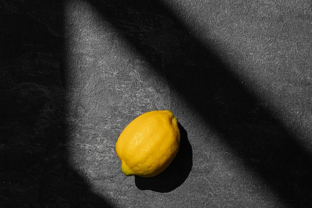 healthy food lemon on dark background top view