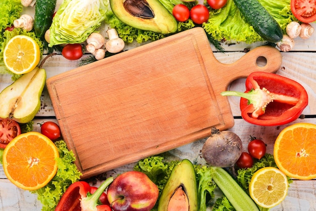 Healthy food Vegetables and fruits On a white wooden background Top view Copy space