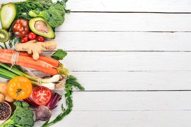 Healthy food Vegetables and fruits On a white wooden background Top view Copy space