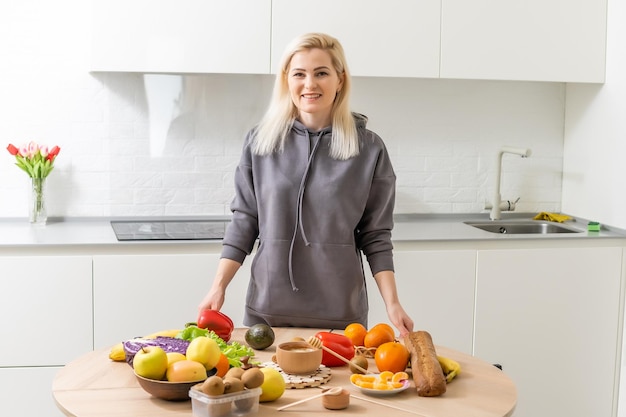 Healthy food. Woman preparing fruits and vegetables.