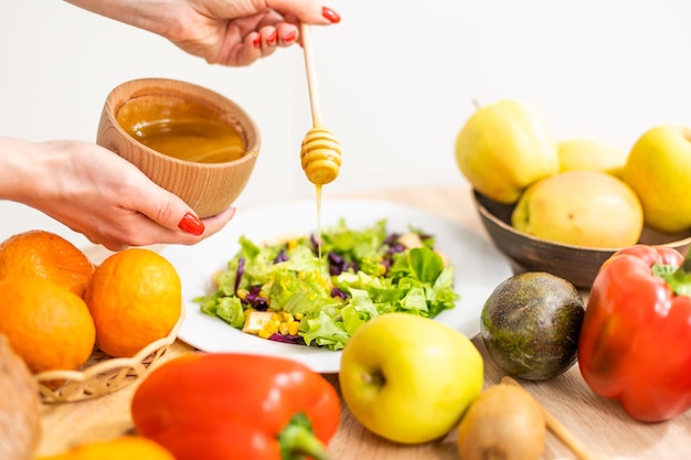 healthy foods are on the table in the kitchen.