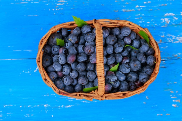 Healthy fresh organic blueberries in a wooden table