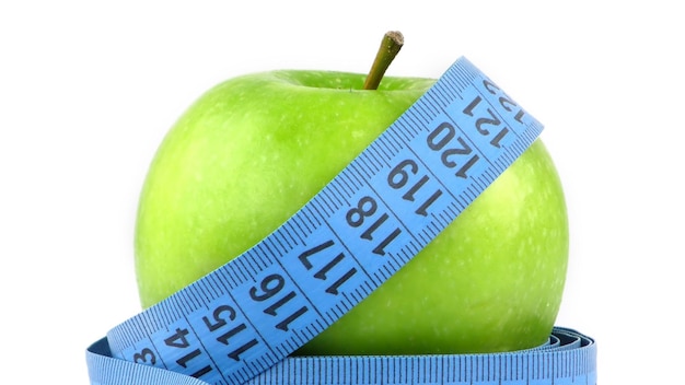 Здоровое фруктовое яблоко и измерение