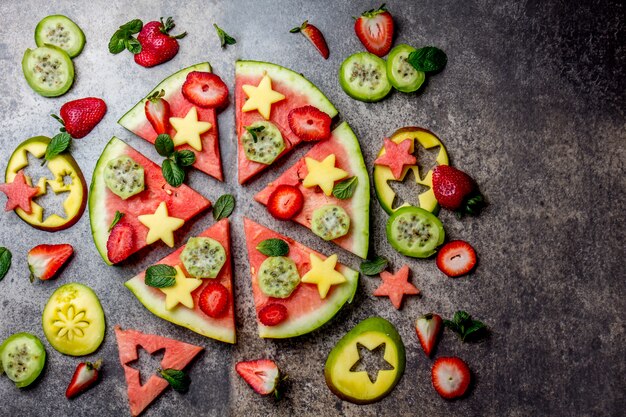 Healthy fruit pizza concept - pizza made of watermelon and fruits