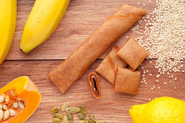 healthy fruit rolls on wooden background