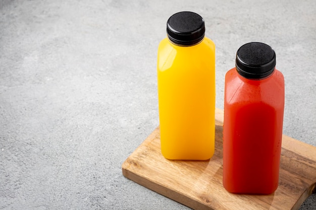 Healthy fruit smoothies in plastic bottles