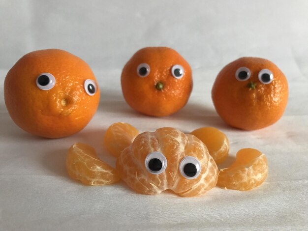 healthy_fun_food_oranges_with_googly_eyes_lookin