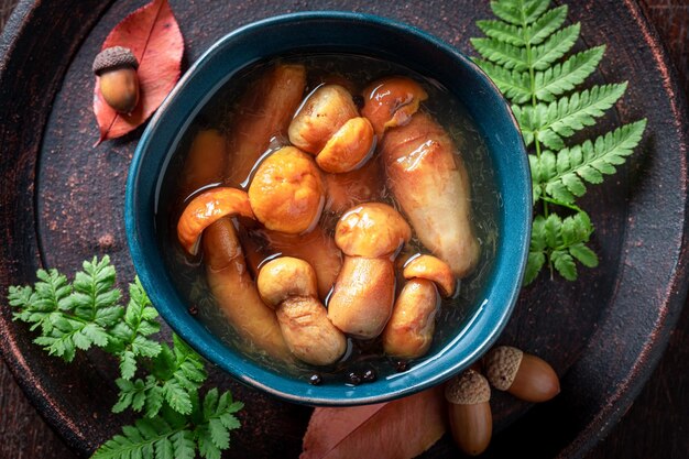 Healthy and homemade boletus mushrooms in vinegar pickle