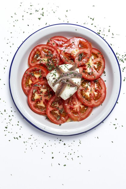 Healthy Homemade Tomato Salad with Mozzarella, Anchovies and Oregano