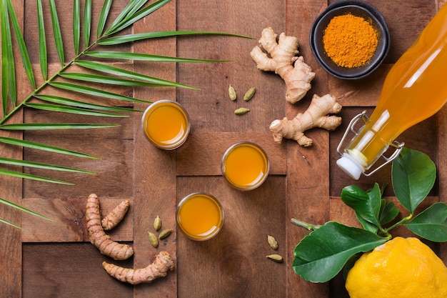 Healthy immune system booster cold and flu remedy Turmeric ginger lemon beverage anti inflammatory smoothie autumn and winter drink Detox clean eating dieting concept