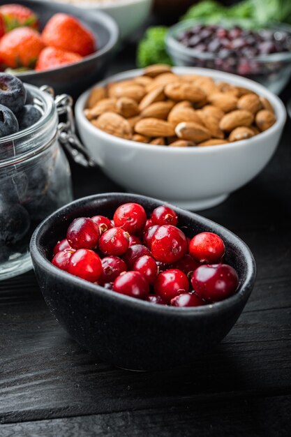 Healthy ingredients on dark wooden background