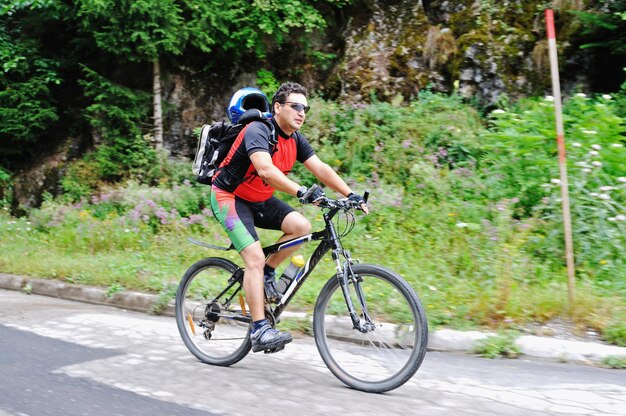 healthy lifestyle and fitness concept with mount bike man outdoor