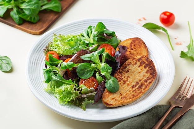 Healthy lunch vegan plant based chicken fillet steak with salad