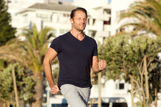 Healthy man jogging outdoors