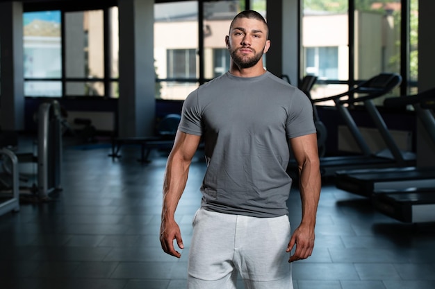 Healthy Man Posing In Gray Tshirt