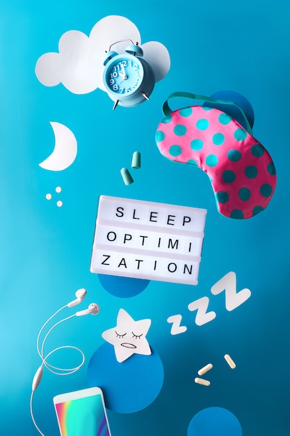 Healthy night sleep creative concept with sleep log or diary notebook.