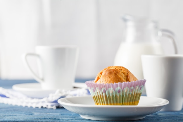 Healthy nutrition with fresh milk and chocolate muffin