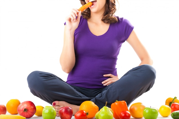 Healthy nutrition - young woman with fruits