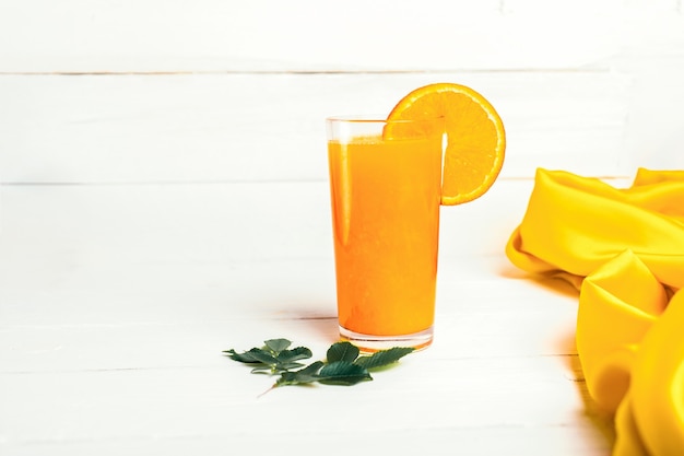 Healthy orange juice on white