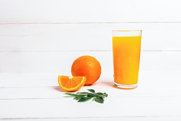 Healthy orange juice on white