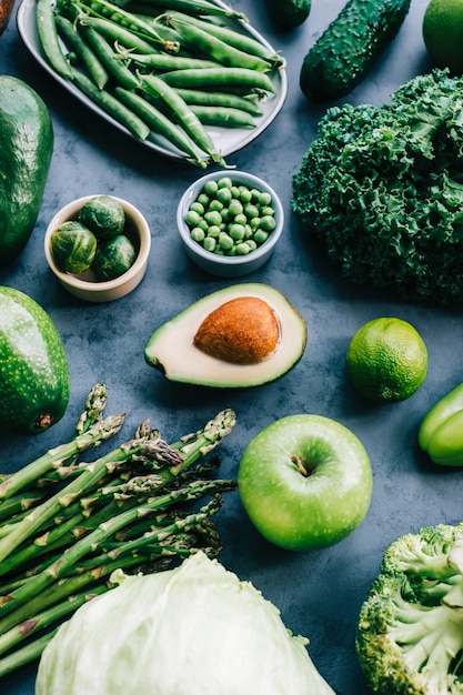 healthy organic green food, assortment of fresh vegetables on the table.