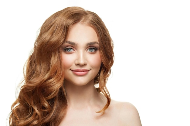 healthy redhead woman with long wavy hair isolated on white background