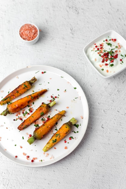 Healthy roasted carrots On white background