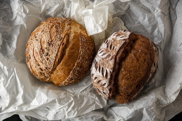 Healthy rye bread slices on the plate on concrete background