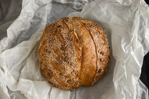 Healthy rye bread slices on the plate on concrete background