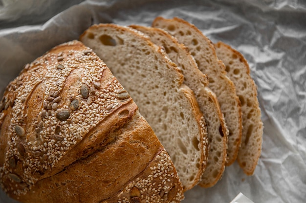 Healthy rye bread slices on the plate on concrete background