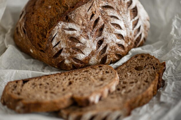 Healthy rye bread slices on the plate on concrete background