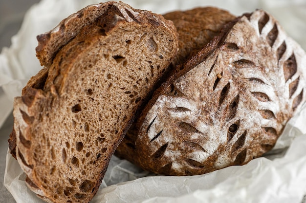 Healthy rye bread slices on the plate on concrete background