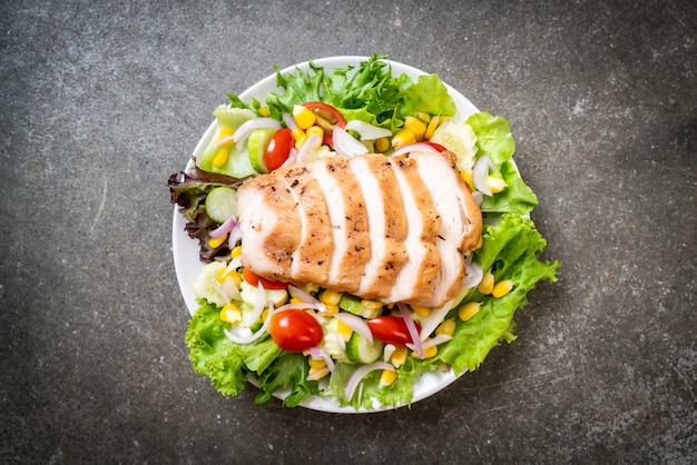 Healthy salad bowl with chicken breast