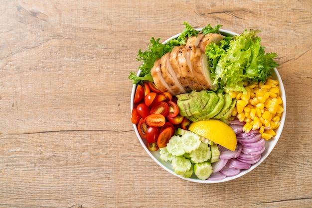 Healthy salad bowl with chicken breast 