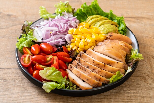 Healthy salad bowl with chicken breast 