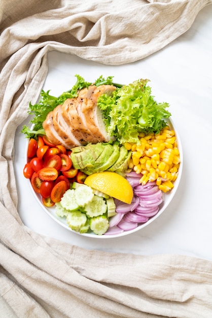 Healthy salad bowl with chicken breast 