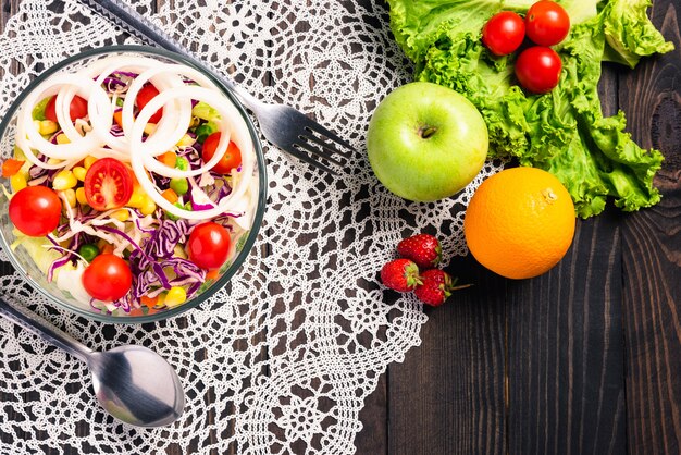 Healthy salad bowl with tomatoes, and mixed vegetable in a dish