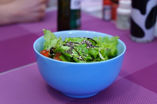 Healthy salad chia seeds lettuce leaves olive oil tomatoes balsamic sauce