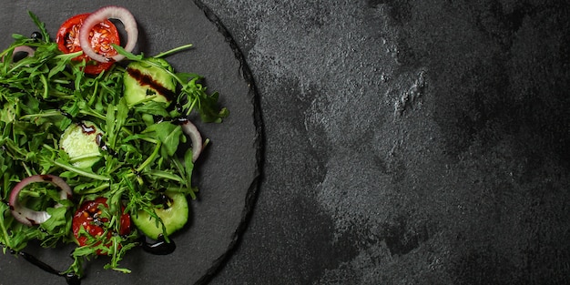 Healthy salad, leaves mix salad (mix micro greens, cucumber, tomato, onion, other ingredients)