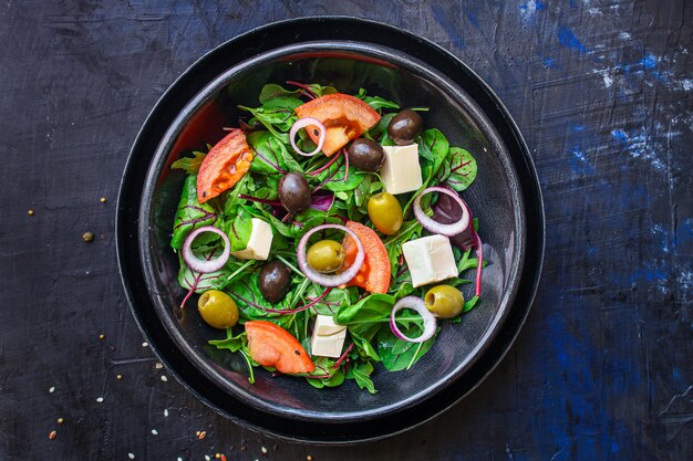 healthy salad olives, lettuce, tomato and cheese feta