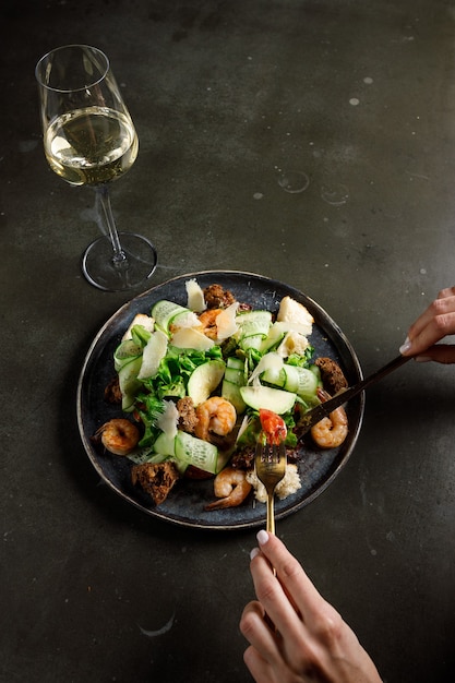 Healthy salad plate. Fresh seafood recipe. Grilled shrimps and fresh vegetable salad and egg. Grilled prawns. Healthy food. Flat lay. Top view