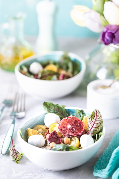 Healthy salad with quinoa, vegetables and grapefruit