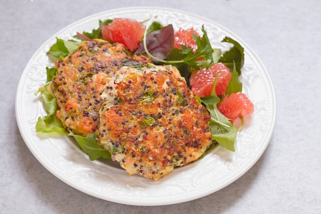 Healthy salmon quinoa kale burger