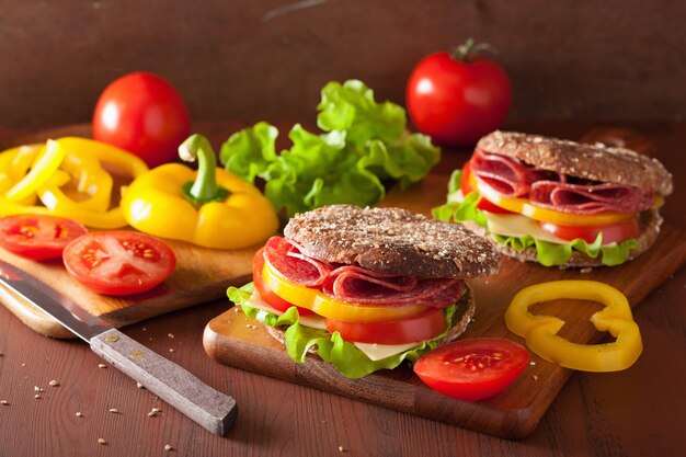 Healthy sandwich with salami tomato pepper and lettuce