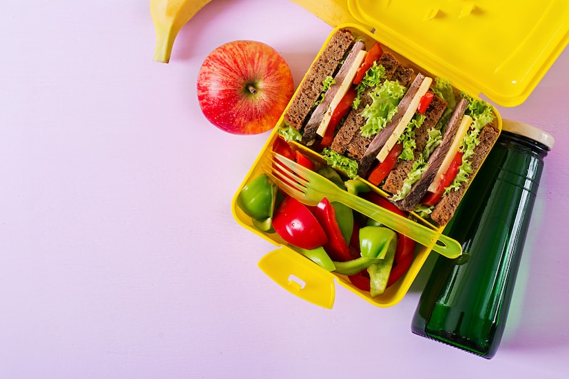 Premium Photo | Healthy school lunch box with beef sandwich and fresh ...
